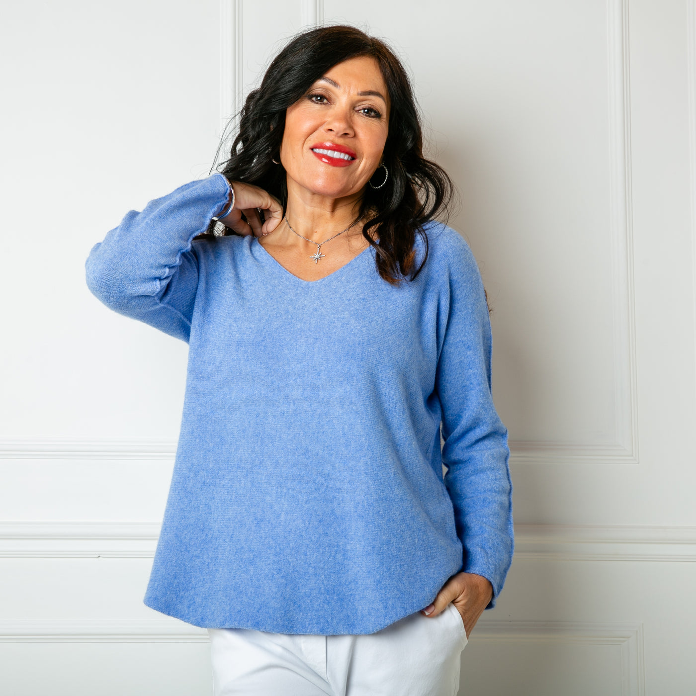 The cornflower blue Soft V Neck Jumper made from a super soft fine knitted blend material